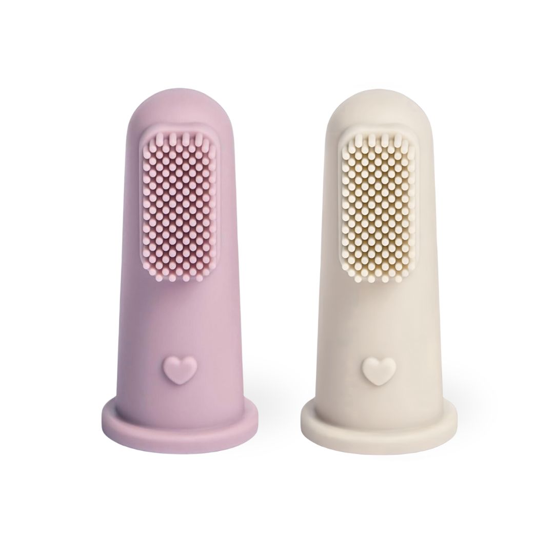 Two baby silicone finger toothbrush, one pink and one beige, on a white background. #color_lavender/cream