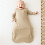 Baby wearing Baby Bliss bamboo sleeper – soft as a cloud, breathable, and made for cozy, safe sleep.