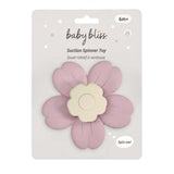 Baby bliss suction spinner toy in a dusty pink flower shape with a cream-colored center, packaged on a light gray card.